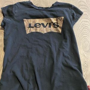 A girls Levi’s shirts.